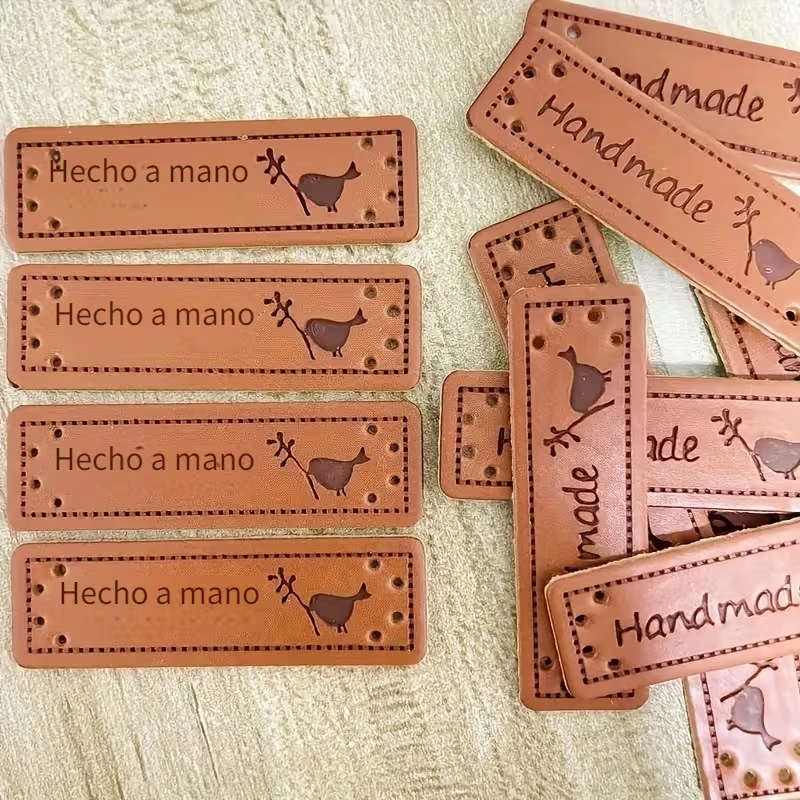 Etiquetas de Cuero PU "Handmade" con Pajarito | 5x1.5 cm | Para Tus Creaciones