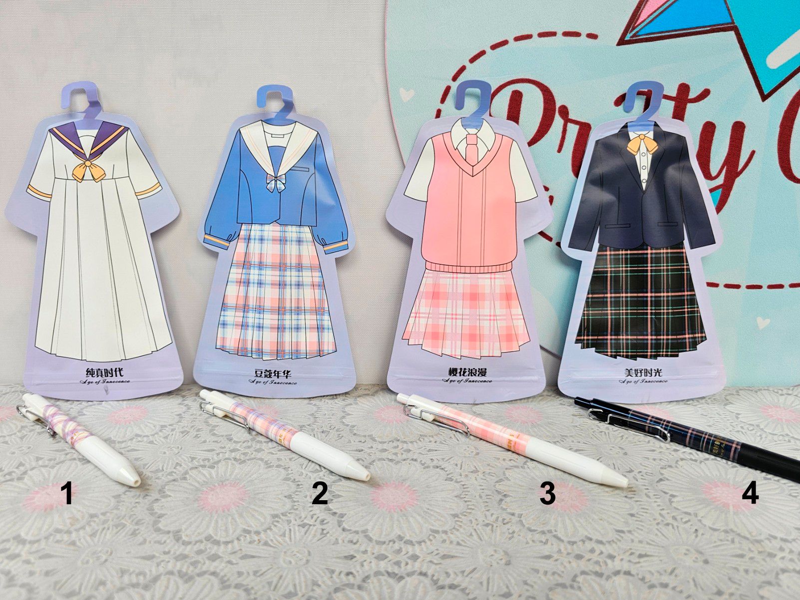 Bolígrafos Sorpresa con Bolsita de Prenda | 4 Diseños, Punta 0.5mm Negro