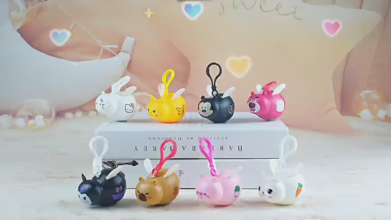 Llavero de personajes que mueven las alas y suenan